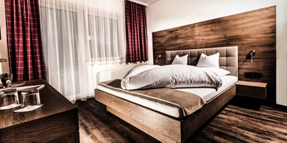 Mountainbike Urlaub - Ellmau - Schlafzimmer Appartement 1 - Aktivhotel Tuxerhof KG