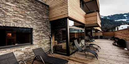 Mountainbike Urlaub - Ellmau - Terrasse Wellnessbereich - Aktivhotel Tuxerhof KG
