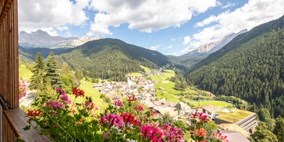 Mountainbike Urlaub - Haustrail - Trentino-Südtirol - Aussicht mit Weitblick auf Rosengarten Latemar  - Niggl easygoing Mounthotel