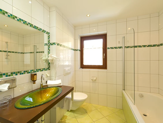 Mountainbikehotel: Badezimmer Junior Suite - Genusshotel Almrausch