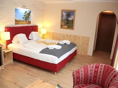 Mountainbikehotel: Familienzimmer Nockalm-Zirbe - Genusshotel Almrausch