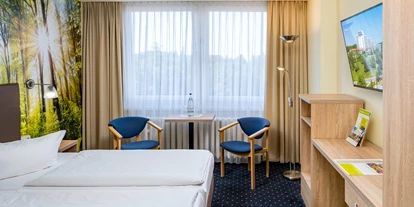 Mountainbike Urlaub - Hotel-Schwerpunkt: Mountainbike & Wandern - Classic Zimmer mit 49-Zoll-TV und kostenlosem WLAN. - AHORN Berghotel Friedrichroda