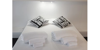 Mountainbike Urlaub - Hotel-Schwerpunkt: Mountainbike & Wandern - King Bett - White Room - Hotel Santoni Freelosophy
