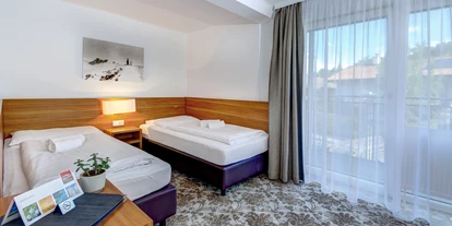Mountainbike Urlaub - Hotel-Schwerpunkt: Mountainbike & Wandern - Kinderschlafzimmer im Familienzimmer - AlpenParks Hotel Maria Alm