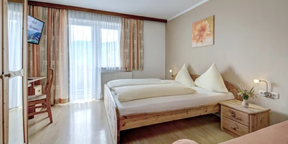 Mountainbike Urlaub - Ellmau - Doppelzimmer mit ausziehbarem Couch in unserem Panorama Appartment - Berghotel Jaga-Alm