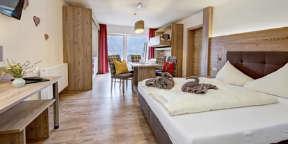 Mountainbike Urlaub - Ellmau - Neues Familienzimmer Tauernblick - Küche extra buchbar - Berghotel Jaga-Alm