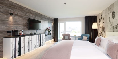 Mountainbike Urlaub - Hotel-Schwerpunkt: Mountainbike & Wandern - In unseren renovierten Komfort Zimmern genießen Sie auf 32 m² die Ruhe des Sauerlandes. Das Komfort Zimmer ist mit einer Sitzecke und Bad/WC, sowie Balkon oder Terrasse mit einem atemberaubenden Blick auf die Höhen des Sauerlandes, ausgestattet. Im Übernachtungspreis sind das Frühstück und die Nutzung von Schwimmbad, Sauna und Dampfbad inklusive. Ein kostenfreier WLAN-Zugang ist ebenfalls vorhanden. 
 - Dorint Resort Winterberg