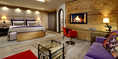 Mountainbike Urlaub - Hotel-Schwerpunkt: Mountainbike & Wandern - Zimmer Calvin im eva,VILLAGE Hotel Saalbach: Natürliche Materialien in den Zimmern bringen die Alpen in jeden Raum. - eva, VILLAGE